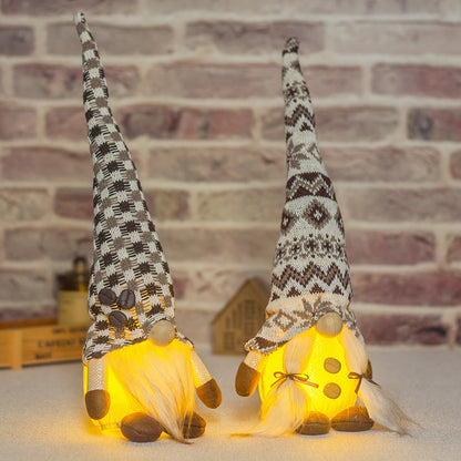 Knitted Doll with Decorative Ornaments in a Long Hat