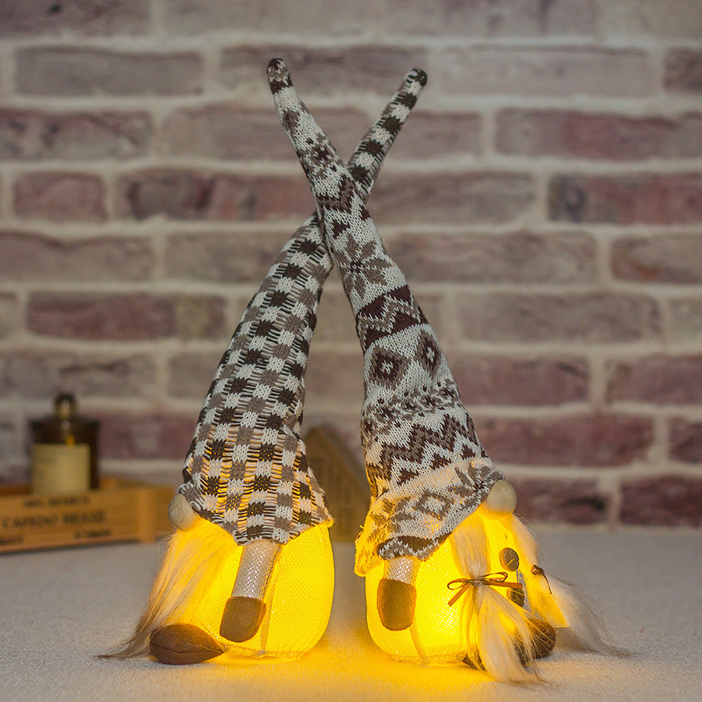 Knitted Doll with Decorative Ornaments in a Long Hat