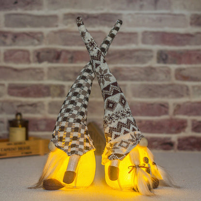 Knitted Doll with Decorative Ornaments in a Long Hat