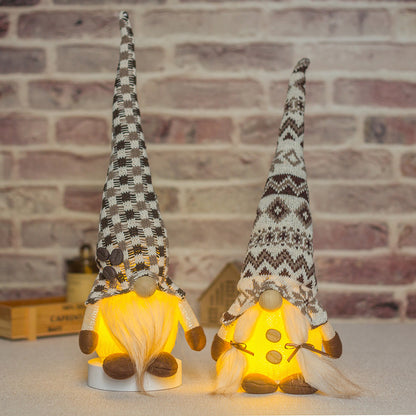 Knitted Doll with Decorative Ornaments in a Long Hat